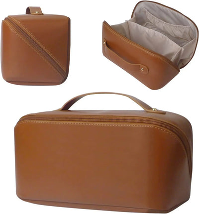 Brown leather toiletry bag with open view showing interior on a white background
