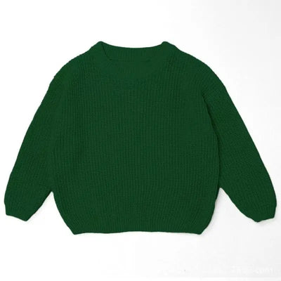 Dark green sweater on a white background