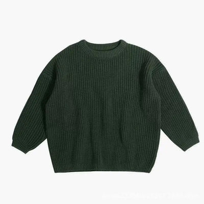 Green knitted sweater on a white background