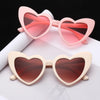 Stylish heart-shaped sunglasses pink and beige