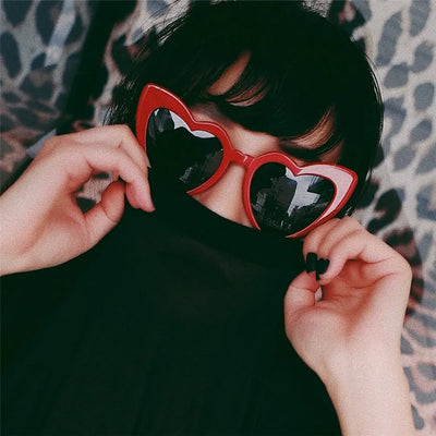 Stylish heart-shaped sunglasses in red