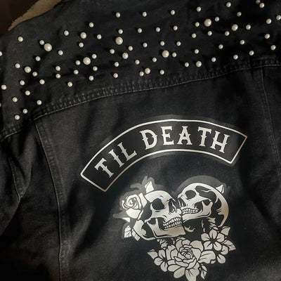 Black jacket with skull and roses design and 'Til Death' text